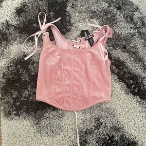 this is corset top, unworn and bought months ago. still in perfect condition!!!